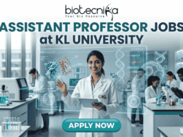 Assistant Professor Jobs at KL University | Food Technology Jobs for PhD Graduates A professional recruitment banner for Assistant Professor jobs at KL University's Food Technology Department. The image features two scientists in a modern laboratory working with bioreactors and 3D food printing technology. It includes the Biotecnika logo at the top and a prominent orange "Apply Now" button at the bottom.