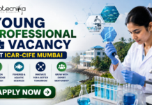 ICAR-CIFE Recruitment 2026 Out Now – Young Professional Vacancy for Life Science Graduates in Mumbai! ICAR Recruitment 2026 Out Now – Young Professional Vacancy. Featured banner for “Young Professional Vacancy at ICAR-CIFE Mumbai” featuring the Biotecnika logo at the top, a young researcher conducting laboratory work with test tubes and a microscope, aquatic science and biotechnology-themed graphics, a coastal research institute backdrop, and a bold “Apply Now” button.