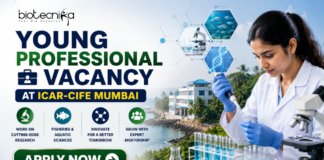 ICAR Recruitment 2026 Out Now – Young Professional Vacancy. Featured banner for “Young Professional Vacancy at ICAR-CIFE Mumbai” featuring the Biotecnika logo at the top, a young researcher conducting laboratory work with test tubes and a microscope, aquatic science and biotechnology-themed graphics, a coastal research institute backdrop, and a bold “Apply Now” button.
