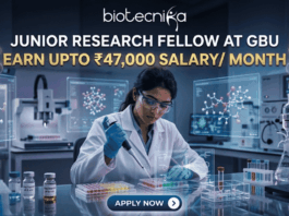 Junior Research Fellow at GBU Earn Upto ₹47,000 Salary Month. A job advertisement featuring a female researcher in a modern drug research lab, using a multi-channel pipette, surrounded by transparent screens displaying 3D molecular structures. Prominent text at the top reads: "JUNIOR RESEARCH FELLOW AT GBU", followed by a central banner stating: "EARN UPTO ₹47,000 SALARY/ MONTH". The biotecnika logo is at the very top, and a blue button at the bottom says: "APPLY NOW".