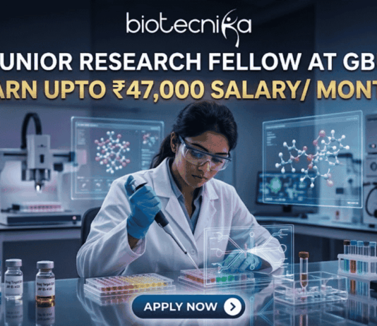 Exciting Junior Research Fellow at GBU | Earn Upto ₹47,000 Salary/ Month Junior Research Fellow at GBU Earn Upto ₹47,000 Salary Month. A job advertisement featuring a female researcher in a modern drug research lab, using a multi-channel pipette, surrounded by transparent screens displaying 3D molecular structures. Prominent text at the top reads: "JUNIOR RESEARCH FELLOW AT GBU", followed by a central banner stating: "EARN UPTO ₹47,000 SALARY/ MONTH". The biotecnika logo is at the very top, and a blue button at the bottom says: "APPLY NOW".