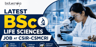 Latest BSc Life Sciences Job at CSIR-CSMCRI | Apply Online Here!! Latest BSc Life Sciences Job at CSIR-CSMCRI Apply Online Here!! Featured banner for “Latest BSc Life Sciences Job at CSIR-CSMCRI” featuring the Biotecnika logo at the top, a life sciences researcher using a microscope in a modern laboratory, marine science and research-themed graphics, career-focused highlights, and a bold “Apply Now” button at the bottom.