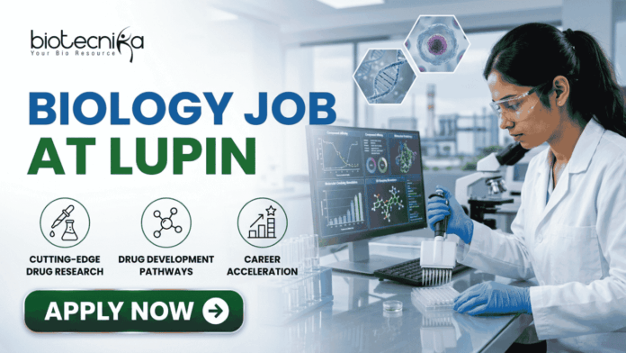 Latest Biology Job At Lupin BSc Candidates Apply Before It's Gone! Latest Biology Job At Lupin BSc Candidates Apply Before It's Gone! A detailed, professional recruitment banner for a "BIOLOGY JOB AT LUPIN" by biotecnika Your Bio Resource. The banner features a focused female Indian scientist in a lab coat and safety glasses, using a multichannel pipette to fill a microplate in a modern laboratory. Overlaid on the background, which includes a campus view and scientific monitors with bio-prospecting data and molecular models, are hexagonal panels displaying a DNA helix, a cell structure, and a plant sample. Three key career benefits are listed with icons in green circles: "CUTTING-EDGE DRUG RESEARCH", "DRUG DEVELOPMENT PATHWAYS", and "CAREER ACCELERATION". A prominent green "APPLY NOW" button with a white right arrow is at the bottom center. The company logo is at the top left, and the job title text is prominent on the left.