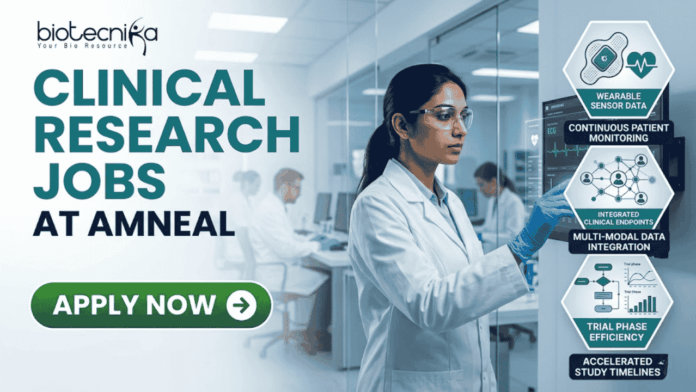 Latest Clinical Research Jobs at Amneal Apply Before It Closes! Latest Clinical Research Jobs at Amneal Apply Before It Closes! A professional corporate recruitment banner for "CLINICAL RESEARCH JOBS AT AMNEAL" featuring the Biotecnika logo. The image showcases a focused female scientist of Indian heritage in a white lab coat and safety goggles, interacting with a high-tech digital monitor displaying clinical trial data and ECG waveforms. To the right, hexagonal icons highlight key clinical research themes: "Continuous Patient Monitoring," "Multi-modal Data Integration," and "Accelerated Study Timelines." The background depicts a modern, brightly lit clinical facility with other researchers at work. A prominent green "APPLY NOW" button with a white arrow is positioned at the bottom left.