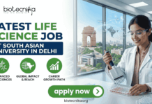 Latest Life Science Job at South Asian University in Delhi | Apply Now Latest Life Science Job at South Asian University in Delhi Apply Now. A professional recruitment banner for the "Latest Life Science Job at South Asian University in Delhi," featuring the Biotecnika logo at the top left. On the right, a female scientist in a white lab coat and safety glasses is shown using a multichannel pipette on a microplate in a modern laboratory setting. The background through a large window offers a clear, realistic view of the India Gate in Delhi, symbolizing the job location. The left side features the bold headline "LATEST LIFE SCIENCE JOB AT SOUTH ASIAN UNIVERSITY IN DELHI" and three green circular icons representing: Advanced Bio-sciences, Global Impact & Reach, and Career Growth Path. A prominent green "apply now" button with a white arrow and the website "biotecnika.org" are located at the bottom.