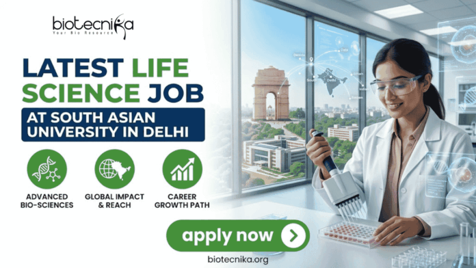 Latest Life Science Job at South Asian University in Delhi Apply Now Latest Life Science Job at South Asian University in Delhi Apply Now. A professional recruitment banner for the "Latest Life Science Job at South Asian University in Delhi," featuring the Biotecnika logo at the top left. On the right, a female scientist in a white lab coat and safety glasses is shown using a multichannel pipette on a microplate in a modern laboratory setting. The background through a large window offers a clear, realistic view of the India Gate in Delhi, symbolizing the job location. The left side features the bold headline "LATEST LIFE SCIENCE JOB AT SOUTH ASIAN UNIVERSITY IN DELHI" and three green circular icons representing: Advanced Bio-sciences, Global Impact & Reach, and Career Growth Path. A prominent green "apply now" button with a white arrow and the website "biotecnika.org" are located at the bottom.