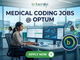 Latest Medical Coding Jobs at Optum | Life Science Candidates Apply Now Latest Medical Coding Jobs at Optum Life Science Candidates Apply Now. A corporate and photorealistic recruitment banner for 'MEDICAL CODING JOBS @ OPTUM' by 'biotecnika'. The image features a focused professional woman of Indian heritage working diligently at a multi-monitor desk with modern office furniture and lab equipment (including a microscope) visible through glass. The central focus is the large, clean text headline: 'MEDICAL CODING JOBS @ OPTUM'. The top left features the 'biotecnika Your Bio Resource' logo. Surrounding the headline is a cluster of interconnected data icons representing medical coding elements and drug research: a complex molecule, a microscope, a DNA helix, a data-streaming research facility, and a team of people, all with a blue and green glowing tech aesthetic. At the bottom, a prominent green button reads 'APPLY NOW' with a right arrow. The design is clean, innovative, and designed to be attention-grabbing and shareable.