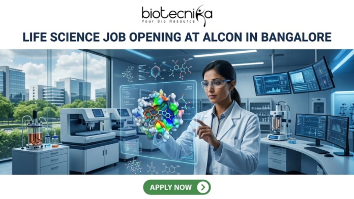Life Science Job Opening at Alcon in Bangalore Life Science Job Opening at Alcon in Bangalore. A corporate job advertisement banner for a Life Science Job Opening at Alcon in Bangalore. The image features a female scientist of South Asian descent in a high-tech laboratory, interacting with a glowing holographic 3D protein-drug molecular model. The background shows advanced lab equipment, data monitors, and a view of modern Bangalore buildings through a large window. The Biotecnika logo is at the top center, the headline is in bold dark text, and a green 'Apply Now' button is located at the bottom.