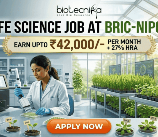 Life Science Job at BRIC-NIPGR 2026 | Earn Upto ₹42,000/- per month + 27% HRA Life Science Job at BRIC-NIPGR 2026 Earn Upto ₹42,000- per month + 27% HRA. An illustrated advertisement for a Life Science Job at BRIC-NIPGR, presented by Biotecnika. The image depicts a female researcher working in a modern laboratory and greenhouse environment with plant growth data monitors. A prominent gold banner highlights a salary offer of "EARN UPTO ₹42,000/- PER MONTH + 27% HRA". At the bottom, there is a large, orange-red "APPLY NOW" button.