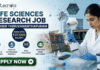Life Sciences Research Job at IISER Thiruvananthapuram | Earn Upto ₹37,000 Salary! Life Sciences Research Job at IISER Thiruvananthapuram Earn Upto ₹37,000 Salary! A professional recruitment banner for a "Life Sciences Research Job @ IISER Thiruvananthapuram" featuring the Biotecnika logo. The image shows a female scientist in a lab coat and blue gloves using a pipette on a well plate, surrounded by high-tech laboratory equipment and computer monitors displaying molecular drug structures. A prominent callout reads "Earn Upto ₹37,000 Salary!" alongside icons for drug discovery, cutting-edge research, and expert mentorship. A green "Apply Now" button is positioned at the bottom left.