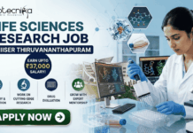 Life Sciences Research Job at IISER Thiruvananthapuram | Earn Upto ₹37,000 Salary! Life Sciences Research Job at IISER Thiruvananthapuram Earn Upto ₹37,000 Salary! A professional recruitment banner for a "Life Sciences Research Job @ IISER Thiruvananthapuram" featuring the Biotecnika logo. The image shows a female scientist in a lab coat and blue gloves using a pipette on a well plate, surrounded by high-tech laboratory equipment and computer monitors displaying molecular drug structures. A prominent callout reads "Earn Upto ₹37,000 Salary!" alongside icons for drug discovery, cutting-edge research, and expert mentorship. A green "Apply Now" button is positioned at the bottom left.