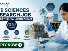 Life Sciences Research Job at IISER Thiruvananthapuram | Earn Upto ₹37,000 Salary! Life Sciences Research Job at IISER Thiruvananthapuram Earn Upto ₹37,000 Salary! A professional recruitment banner for a "Life Sciences Research Job @ IISER Thiruvananthapuram" featuring the Biotecnika logo. The image shows a female scientist in a lab coat and blue gloves using a pipette on a well plate, surrounded by high-tech laboratory equipment and computer monitors displaying molecular drug structures. A prominent callout reads "Earn Upto ₹37,000 Salary!" alongside icons for drug discovery, cutting-edge research, and expert mentorship. A green "Apply Now" button is positioned at the bottom left.