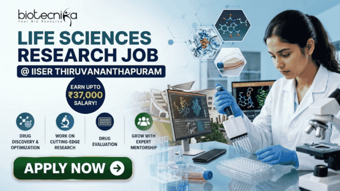 Life Sciences Research Job at IISER Thiruvananthapuram Earn Upto ₹37,000 Salary! Life Sciences Research Job at IISER Thiruvananthapuram Earn Upto ₹37,000 Salary! A professional recruitment banner for a "Life Sciences Research Job @ IISER Thiruvananthapuram" featuring the Biotecnika logo. The image shows a female scientist in a lab coat and blue gloves using a pipette on a well plate, surrounded by high-tech laboratory equipment and computer monitors displaying molecular drug structures. A prominent callout reads "Earn Upto ₹37,000 Salary!" alongside icons for drug discovery, cutting-edge research, and expert mentorship. A green "Apply Now" button is positioned at the bottom left.