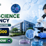 MSc Life Science Vacancy at BRIC-inStem in Bangalore | Earn Upto ₹37,000 Salary MSc Life Science Vacancy at BRIC-inStem in Bangalore Apply. Featured banner for “MSc Life Science Vacancy at BRIC-inStem” featuring the Biotecnika logo at the top, a life sciences researcher using a microscope in a modern biotechnology laboratory, DNA and molecular research-themed graphics, a salary highlight showing “Earn Upto ₹37,000,” a research institute campus backdrop, and a bold “Apply Now” button at the bottom.