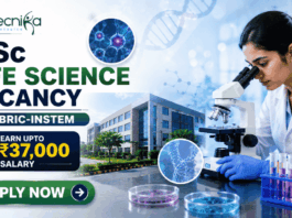 MSc Life Science Vacancy at BRIC-inStem in Bangalore Apply. Featured banner for “MSc Life Science Vacancy at BRIC-inStem” featuring the Biotecnika logo at the top, a life sciences researcher using a microscope in a modern biotechnology laboratory, DNA and molecular research-themed graphics, a salary highlight showing “Earn Upto ₹37,000,” a research institute campus backdrop, and a bold “Apply Now” button at the bottom.