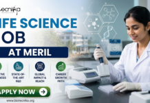 Meril Life Science Job 2026 | Research Role in Gujarat for M.Sc & PhD Candidates Meril Life Science Job 2026 Research Role in Gujarat for M.Sc & PhD Candidates. Meril Life Science Job 2026 Research Role in Gujarat for M.Sc & PhD Candidates. A professional recruitment banner for a "Life Science Job at Meril," featuring the Biotecnika logo at the top left. On the right, a female scientist in a white lab coat is shown working in a bright, modern laboratory, using a multichannel pipette on a microplate. The left side displays the bold headline "LIFE SCIENCE JOB AT MERIL" and four circular icons representing: Innovative Bio-sciences, State-of-the-Art R&D, Global Impact & Reach, and Career Growth Path. The background features floating scientific diagrams and a view of a research campus through a window. A prominent green "Apply Now" button and the website "www.biotecnika.org" are located at the bottom.