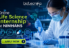 Online Life Science Internship at NIMHANS Opportunity for UG & PG Students “Featured banner for an Online Life Science Internship at NIMHANS, showing a female scientist conducting drug research in a modern biotech laboratory with test tubes, microscope, and digital brain scan displays. The Biotecnika logo is placed at the top, with a glowing ‘Apply Now’ button at the bottom and futuristic blue scientific graphics in the background.”