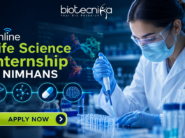 Online Life Science Internship at NIMHANS | Opportunity for UG & PG Students Online Life Science Internship at NIMHANS Opportunity for UG & PG Students “Featured banner for an Online Life Science Internship at NIMHANS, showing a female scientist conducting drug research in a modern biotech laboratory with test tubes, microscope, and digital brain scan displays. The Biotecnika logo is placed at the top, with a glowing ‘Apply Now’ button at the bottom and futuristic blue scientific graphics in the background.”