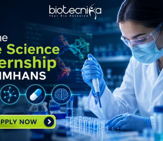 Online Life Science Internship at NIMHANS Opportunity for UG & PG Students “Featured banner for an Online Life Science Internship at NIMHANS, showing a female scientist conducting drug research in a modern biotech laboratory with test tubes, microscope, and digital brain scan displays. The Biotecnika logo is placed at the top, with a glowing ‘Apply Now’ button at the bottom and futuristic blue scientific graphics in the background.”