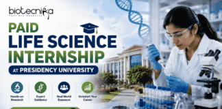 Paid Life Science Internship at Presidency University Project Intern Opportunity for MSc Candidates! Featured banner for “Paid Life Science Internship at Presidency University” featuring the Biotecnika logo at the top, a life sciences researcher working in a modern laboratory, a university campus backdrop, biotechnology-themed graphics, and a bold “Apply Now” button at the bottom.