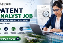 Latest Patent Analyst Job at Microcrispr Pvt. Ltd. (Meril) in Gujarat | Apply Now Patent Analyst Job at Microcrispr Pvt. Ltd. (Meril) in Gujarat Apply. Featured banner for “Patent Analyst Job at Microcrispr Pvt. Ltd. (Meril) in Gujarat” featuring the Biotecnika logo at the top, a professional patent analyst working on a laptop in a modern office setting, patent document and intellectual property-themed graphics, biotechnology research visuals, and a bold “Apply Now” button at the bottom.