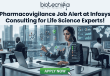 Pharmacovigilance Job Alert at Infosys Consulting for Life Science Experts! Pharmacovigilance Job Alert at Infosys Consulting for Life Science Experts! A job advertisement graphic with text at the top that reads: "biotecnika" and "Your Bio Resource" with a stylized icon, followed by the headline, "Pharmacovigilance Job Alert at Infosys Consulting for Life Science Experts!". The central image shows a woman of South Asian descent wearing a headset, seated at a desk with a laptop in a modern office setting. She is looking at and reaching toward a futuristic, transparent data display interface with molecular structures, a world map, data charts, and labels like "Safety Reports," "Product Reports," and a "Safety Map" legend indicating colored zones for alert, warning, and safety. Other employees are working at desks in the background of a glass-walled high-rise office. At the bottom center, there is a large green button with white text that reads "APPLY NOW", and a hand cursor is clicking it.