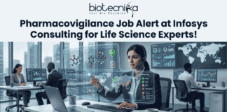 Pharmacovigilance Job Alert at Infosys Consulting for Life Science Experts! Pharmacovigilance Job Alert at Infosys Consulting for Life Science Experts! A job advertisement graphic with text at the top that reads: "biotecnika" and "Your Bio Resource" with a stylized icon, followed by the headline, "Pharmacovigilance Job Alert at Infosys Consulting for Life Science Experts!". The central image shows a woman of South Asian descent wearing a headset, seated at a desk with a laptop in a modern office setting. She is looking at and reaching toward a futuristic, transparent data display interface with molecular structures, a world map, data charts, and labels like "Safety Reports," "Product Reports," and a "Safety Map" legend indicating colored zones for alert, warning, and safety. Other employees are working at desks in the background of a glass-walled high-rise office. At the bottom center, there is a large green button with white text that reads "APPLY NOW", and a hand cursor is clicking it.