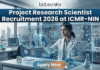 Project Research Scientist Recruitment 2026 at ICMR-NIN | Earn Upto Rs. 56,000/- Project Research Scientist Recruitment 2026 at ICMR-NIN. A professional and high-tech featured image for the Project Research Scientist Recruitment 2026 at ICMR-NIN. The image depicts a female scientist in a white lab coat interacting with a glowing, transparent digital interface that displays complex nutritional genomics data, 3D DNA structures, and metabolic charts. The background shows a modern, sunlit laboratory with a city skyline visible through the window. The Biotecnika logo is featured at the top center, and a prominent teal "Apply Now" button is positioned at the bottom.