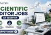 Scientific Editor Jobs at Elsevier | PhD Candidates Apply Now! Scientific Editor Jobs at Elsevier | PhD Candidates Apply Now! A professional featured image for "Scientific Editor Jobs at Elsevier" featuring the Biotecnika logo at the top left. On the right, a woman in a grey business blazer is seated at a desk, focused on a computer screen showing an edited research manuscript. The left side displays the bold headline "SCIENTIFIC EDITOR JOBS AT ELSEVIER" along with three icons representing research evaluation, scientific communication, and shaping the academic future. The background includes floating scientific diagrams and a scenic coastal building view, with a prominent "Apply Now" button at the bottom.