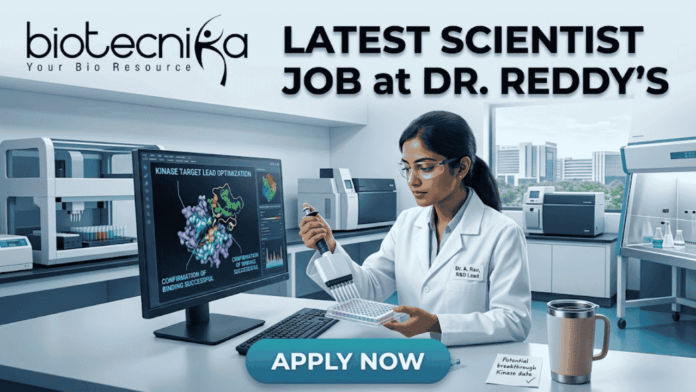 Scientist Job at Dr. Reddy’s MSc Food Science Job Scientist Job at Dr. Reddy’s MSc Food Science Job. A detailed job advertisement image for a scientist position. At the top-left is the biotecnika logo 'biotecnika Your Bio Resource'. Large headline text to the top-right reads: 'LATEST SCIENTIST JOB at DR. REDDY'S'. The central scene features a focused female scientist, 'Dr. A. Rao, R&D Lead', in a modern, high-tech pharmaceutical research laboratory. She is working at a computer station, using a multi-channel pipette on a multi-well plate. Her monitor displays complex 3D molecular visualizations of protein structures, with text labels like 'KINASE TARGET LEAD OPTIMIZATION' and 'CONFIRMATION OF BINDING SUCCESSFUL'. The extensive lab background shows automated equipment, analytical tools, and a view of a modern city from a window. A coffee mug and a sticky note reading 'Potential breakthrough kinase data' are on the desk. A prominent blue 'APPLY NOW' button is at the bottom center.