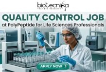 Urgent Hiring! Quality Control Job at PolyPeptide for Life Sciences Professionals! Urgent Hiring! Quality Control Job at PolyPeptide for Life Sciences Professionals! A promotional banner for a "Quality Control Job" at PolyPeptide, presented by biotecnika, "Your Bio Resource". The banner features a large, central text headline "QUALITY CONTROL JOB", with smaller text below it "at PolyPeptide for Life Sciences Professionals". The main visual element shows a scientist, wearing a white lab coat, hairnet, safety glasses, and blue gloves, carefully using a pipette to transfer a sample into a grid of small glass vials on an automated machine in a modern, clean laboratory setting. Various other pieces of lab equipment, including machines and beakers, are visible in the background. A prominent teal button at the bottom center has an arrow and the text "APPLY NOW >". The biotecnika logo, with a stylized human figure, is positioned at the top center.