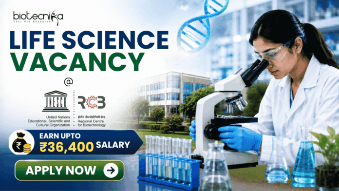 ₹36,400 Salary Life Science Vacancy at RCB for MSc & BSc Life Science Candidates! ₹36,400 Salary Life Science Vacancy at RCB for MSc & BSc Life Science Candidates! Featured banner for “Life Science Vacancy at RCB” featuring the Biotecnika logo at the top, a researcher using a microscope in a modern life sciences laboratory, DNA and biotechnology-themed graphics, highlights for MSc and Life Science graduates, a salary badge showing “Earn Upto ₹36,400,” and a bold “Apply Now” button at the bottom.
