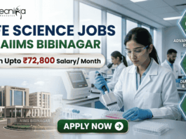 ₹72,800 Salary AIIMS Bibinagar Life Science Jobs 2026 | Research & Microbiology Openings ₹72,800 Salary AIIMS Bibinagar Life Science Jobs 2026 Research & Microbiology Openings. A professional corporate recruitment banner for "LIFE SCIENCE JOBS AT AIIMS BIBINAGAR" featuring the Biotecnika logo at the top. The image displays a focused female scientist in a white lab coat and safety glasses using a multichannel pipette in a state-of-the-art laboratory. An inset on the bottom left shows the modern AIIMS Bibinagar campus building. A prominent gold-bordered callout highlights "Earn Upto ₹72,800 Salary/ Month." Three teal hexagonal icons on the right represent "ADVANCED MEDICAL RESEARCH," "DIAGNOSTICS & GENETICS," and "CLINICAL APPLICATIONS." A green "APPLY NOW" button with a white arrow is positioned at the bottom center.