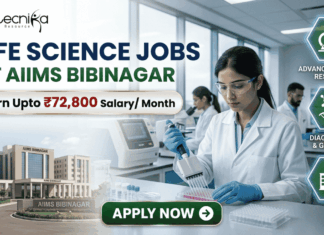 ₹72,800 Salary AIIMS Bibinagar Life Science Jobs 2026 | Research & Microbiology Openings ₹72,800 Salary AIIMS Bibinagar Life Science Jobs 2026 Research & Microbiology Openings. A professional corporate recruitment banner for "LIFE SCIENCE JOBS AT AIIMS BIBINAGAR" featuring the Biotecnika logo at the top. The image displays a focused female scientist in a white lab coat and safety glasses using a multichannel pipette in a state-of-the-art laboratory. An inset on the bottom left shows the modern AIIMS Bibinagar campus building. A prominent gold-bordered callout highlights "Earn Upto ₹72,800 Salary/ Month." Three teal hexagonal icons on the right represent "ADVANCED MEDICAL RESEARCH," "DIAGNOSTICS & GENETICS," and "CLINICAL APPLICATIONS." A green "APPLY NOW" button with a white arrow is positioned at the bottom center.
