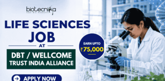 ₹75,000 Salary For Life Sciences Job at DBT/Wellcome Trust India Alliance ₹75,000 Salary For Life Sciences Job at DBTWellcome Trust India Alliance. Featured banner for “Life Sciences Job at DBT/Wellcome Trust India Alliance” featuring the Biotecnika logo at the top, a scientist performing laboratory research with a microscope, DNA and biotechnology-themed graphics, a highlighted “Earn Upto ₹75,000” badge, and a bold “Apply Now” button at the bottom.