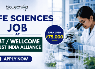 ₹75,000 Salary For Life Sciences Job at DBT/Wellcome Trust India Alliance ₹75,000 Salary For Life Sciences Job at DBTWellcome Trust India Alliance. Featured banner for “Life Sciences Job at DBT/Wellcome Trust India Alliance” featuring the Biotecnika logo at the top, a scientist performing laboratory research with a microscope, DNA and biotechnology-themed graphics, a highlighted “Earn Upto ₹75,000” badge, and a bold “Apply Now” button at the bottom.