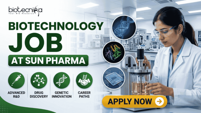 Biotechnology Job at Sun Pharma Opportunity for MSc & MTech Candidates Biotechnology Job at Sun Pharma Opportunity for MSc & MTech Candidates. A professional promotional banner for a "Biotechnology Job at Sun Pharma." The top left displays the Biotecnika logo. The main header text boldly reads "BIOTECHNOLOGY JOB AT SUN PHARMA" in a green and dark color scheme. Below the title, four circular green icons are labeled: "ADVANCED R&D", "DRUG DISCOVERY", "GENETIC INNOVATION", and "CAREER PATHS". In the center, three floating circular graphics illustrate a DNA double helix, a colorful protein model, and a biochip. On the right side, a female researcher wearing a white lab coat and safety glasses works attentively with a laboratory bioreactor containing a golden liquid, set against a bright, modern pharmaceutical lab background. A prominent gold "APPLY NOW" button with an arrow sits at the bottom center-right.