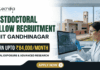 IIT Gandhinagar Postdoctoral Fellowship | Earn Up to ₹84,000/Month in Biomedical Research IIT Gandhinagar Postdoctoral Fellowship Earn Up to ₹84,000Month in Biomedical Research A corporate-style promotional banner for "Postdoctoral Fellow Recruitment at IIT Gandhinagar". The top left displays the Biotecnika logo, followed by bold text that reads "POSTDOCTORAL FELLOW RECRUITMENT at IIT GANDHINAGAR". A highlighted black and gold badge reads "EARN UPTO ₹84,000/MONTH", accompanied by the subtitle "GLOBAL EXPOSURE & ADVANCED RESEARCH". On the right side, a female researcher in a white lab coat, safety glasses, and blue gloves works at a computer monitor in a modern laboratory. Through the large window behind her, the iconic brick architecture of the IIT Gandhinagar campus is visible. A gold "APPLY NOW" button is positioned at the bottom center.