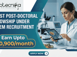 Latest Post-Doctoral Fellowship under NIFTEM Recruitment Earn ₹70,900month. A corporate-style job featured image banner (1280x720) for "Latest Post-Doctoral Fellowship under NIFTEM Recruitment" featuring the Biotecnika CRO logo at the top left. The left side uses a sleek dark teal and blue geometric layout to showcase the main headline and a prominent highlighted badge reading "Earn Upto ₹70,900/month". On the right, a realistic and focused young female scientist in a white lab coat interacts with a tablet displaying food data analysis. A plate of fresh vegetables sits on her workspace next to a high-tech laboratory microscope in a clean background. A teal "APPLY NOW" button is centered at the bottom.