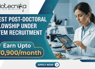 Latest Post-Doctoral Fellowship under NIFTEM Recruitment | Earn ₹70,900/month Latest Post-Doctoral Fellowship under NIFTEM Recruitment Earn ₹70,900month. A corporate-style job featured image banner (1280x720) for "Latest Post-Doctoral Fellowship under NIFTEM Recruitment" featuring the Biotecnika CRO logo at the top left. The left side uses a sleek dark teal and blue geometric layout to showcase the main headline and a prominent highlighted badge reading "Earn Upto ₹70,900/month". On the right, a realistic and focused young female scientist in a white lab coat interacts with a tablet displaying food data analysis. A plate of fresh vegetables sits on her workspace next to a high-tech laboratory microscope in a clean background. A teal "APPLY NOW" button is centered at the bottom.