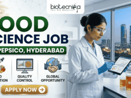 PepsiCo R&D Hiring in Hyderabad | Food Science Job You Shouldn’t Miss! PepsiCo R&D Hiring in Hyderabad Food Science Job You Shouldn’t Miss! A promotional banner with a light background on the left and a lab scene on the right. Main title text at the top reads: "FOOD SCIENCE JOB AT PEPSICO, HYDERABAD". The top-left features the "biotecnika" logo. Below the title on the left are three colored icons labeled: "FOOD INNOVATION" (bowl of grains), "QUALITY CONTROL" (computer monitor), and "GLOBAL OPPORTUNITY" (world globe with buildings). A prominent gold "APPLY NOW" button with a right arrow is below the icons. A female scientist in a lab coat, safety glasses, and blue gloves holds a tablet on the right. She stands next to beakers containing liquids and a computer monitor, with a large window in the background showing a view of a city skyline (Hyderabad) at night.