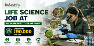 Wildlife Institute of India Recuitment 2026 Life Science Job with ₹90,000 Salary – Apply Before Deadline! Featured banner for “Life Science Job at Wildlife Institute of India” featuring the Biotecnika logo at the top, a wildlife researcher conducting field-based biological research with a microscope in a natural forest setting, wildlife visuals including animals and biodiversity elements, a salary highlight showing “Earn Upto ₹90,000,” conservation and ecological research-themed graphics, and a bold “Apply Now” button at the bottom.