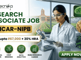 ₹67,000 Salary Research Associate Job at ICAR-NIPB. A professional promotional banner for a "Research Associate Job at ICAR-IARI." The top left corner features the Biotecnika logo. On the left side, bold text reads "RESEARCH ASSOCIATE JOB AT ICAR-IARI", sitting above a highlighted white badge that reads "Earn upto ₹67,000 + 30% HRA". Below the salary badge, four green circular icons are labeled: "AGRICULTURAL INNOVATION", "CROP BREEDING", "DATA ANALYTICS", and "BUILD RESEARCH CAREER". On the right side, a female researcher in a white lab coat and gloves works with a digital tablet and handheld scientific device at a lab counter. Through the large window behind her, the historic brick building and fields of the ICAR-IARI campus are visible. The far right includes three floating circular graphics showcasing plant cell structures, a wheat grain molecular model, and digital gene mapping data. A prominent green "APPLY NOW" button with an arrow is located at the bottom right.